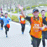 昨日，武汉园博园，作为汉马的前奏之一，园博园迎春跑吸引了众多市民参加   记者贾代腾飞 摄 - 新浪湖北
