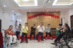 图为文卉苑阳光家园学员表演手舞《感恩的心》 - 残疾人联合会