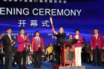 图为中国狮子会副会长郭明飞代表广大狮友点燃圣火 - 残疾人联合会