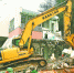龟山整治正在进行拆迁作业 武汉市园林和林业局供图 - 新浪湖北