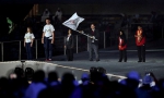 3月21日，第十五届世界夏季特殊奥林匹克运动会在阿联酋阿布扎比闭幕。图为特奥会会旗交接仪式（3月21日摄）。新华社记者夏一方摄 - 残疾人联合会
