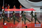 8月25日，旗手护送中华人民共和国国旗进入开幕式现场 - 残疾人联合会