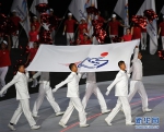 8月25日，旗手护送中华人民共和国残疾人运动会会旗进入开幕式现场 - 残疾人联合会