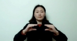 3图为武昌区聋协主席魏尚茹手语表演冰雪运动项目 - 残疾人联合会